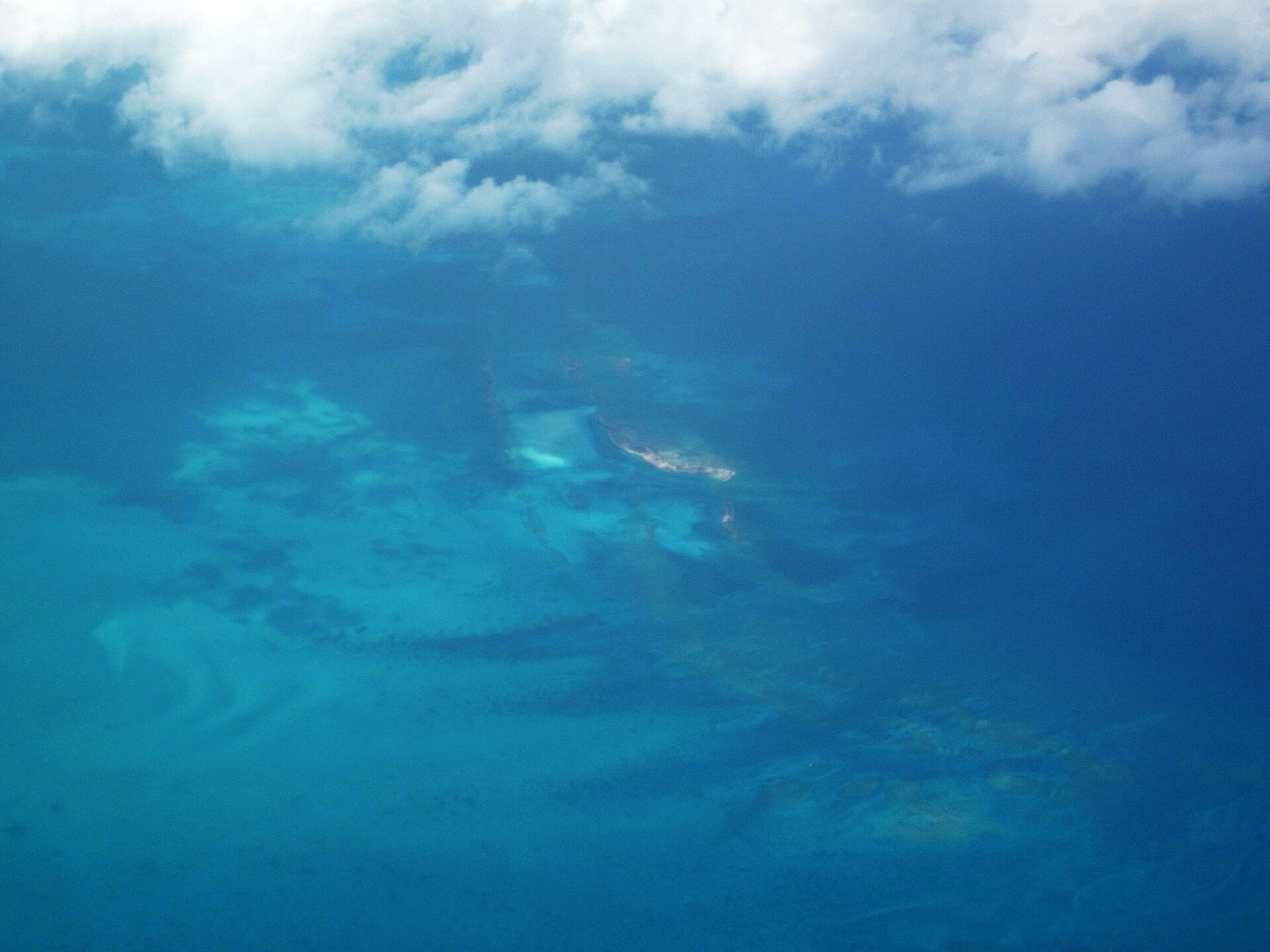 Aerial view of reefs and small cays in the northern Exumas