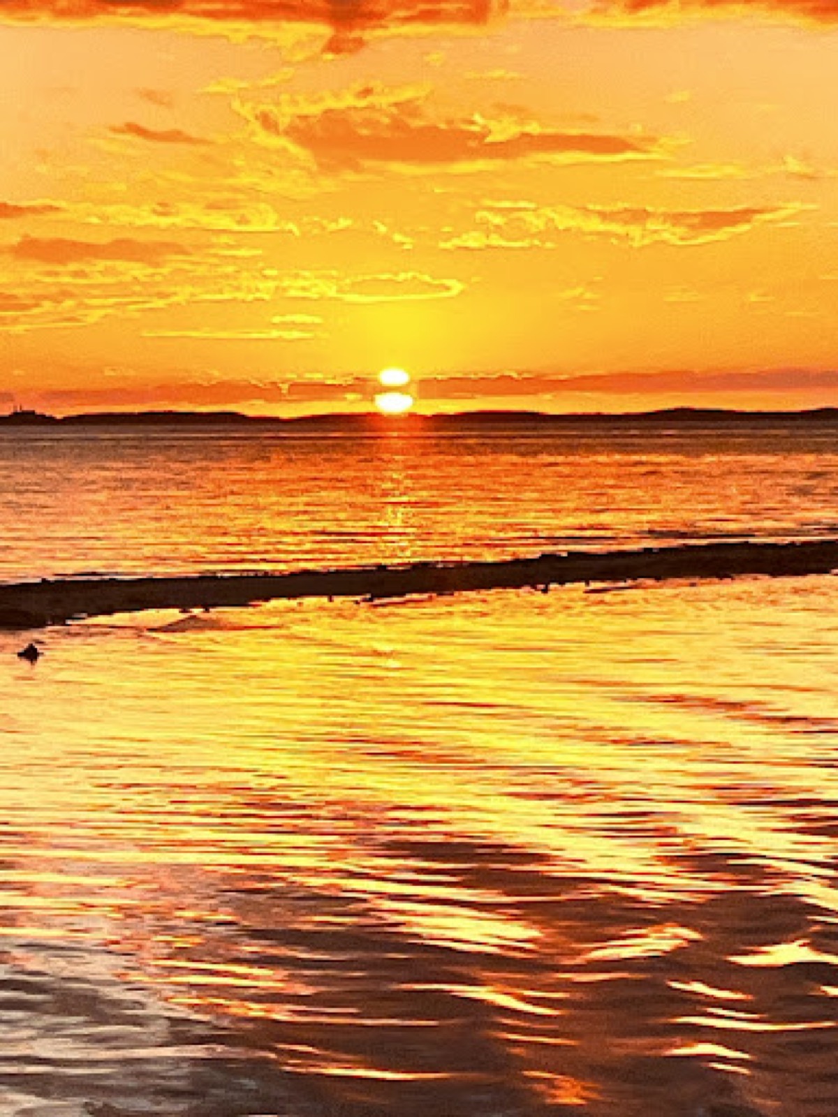 Sunset over shallow water in the Exumas