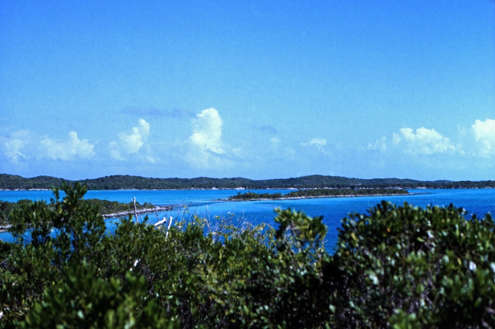 View across Great Exuma's northeast coast: small cays and turquoise water under a blue sky